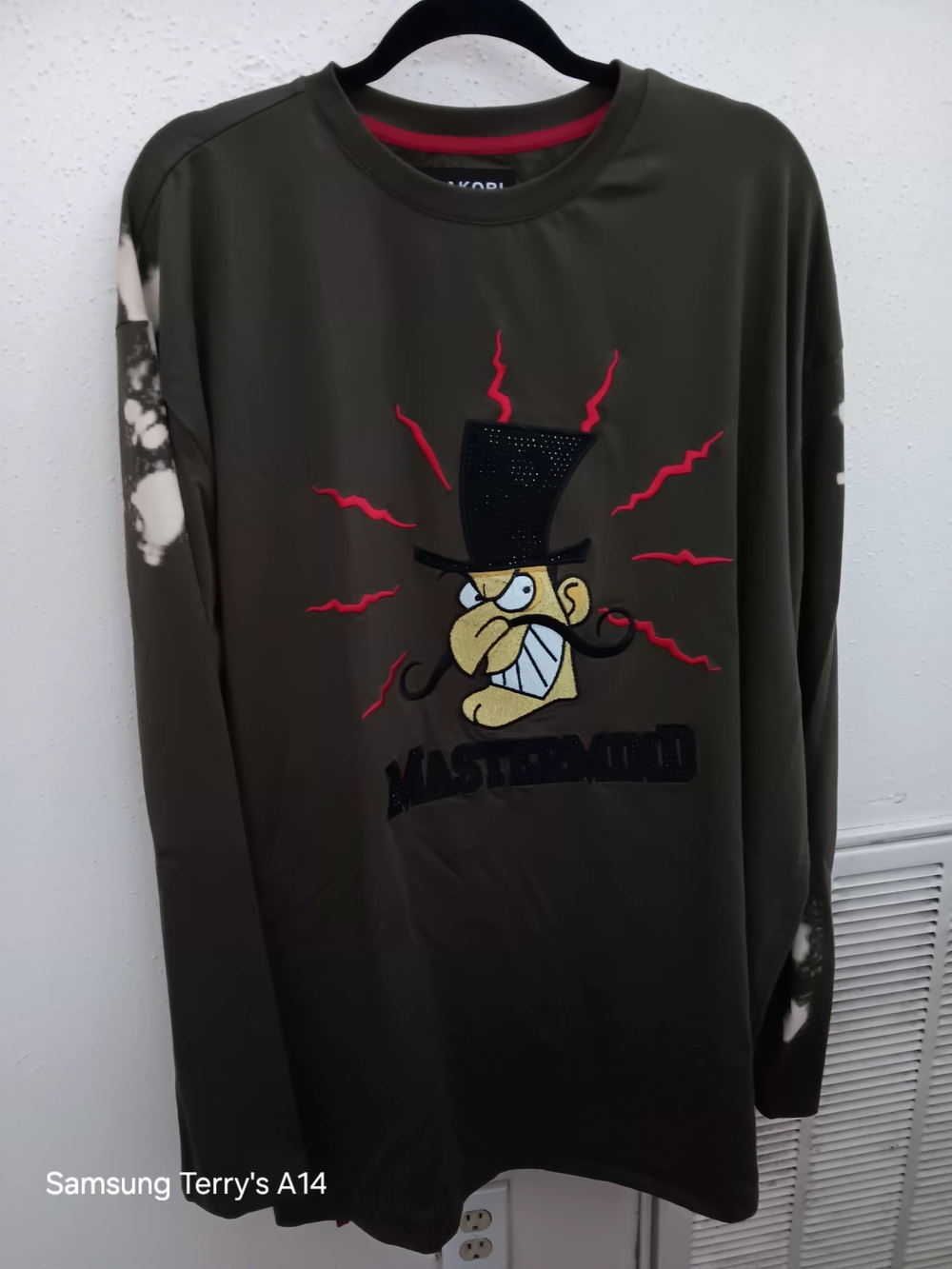 Makobi - Mastermind Logo Olive Green Long-Sleeve Graphic Tee with Red Accents